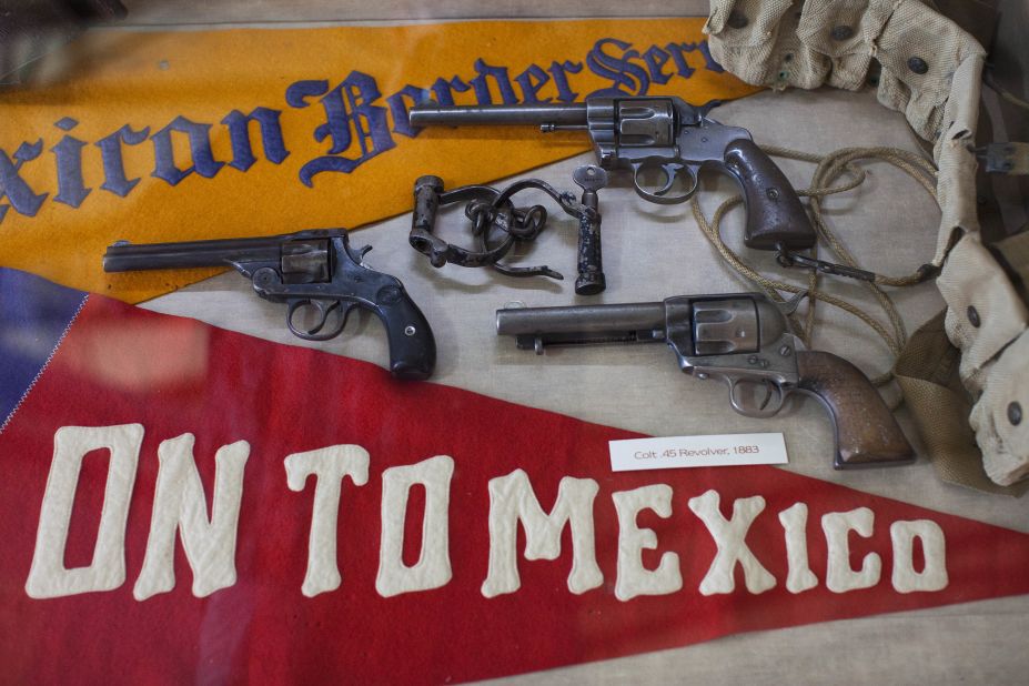 Military artifacts, including pistols and propaganda, are on display at the Pancho Villa State Park Museum in Columbus, New Mexico. Columbus was raided in 1916 by Villa and his army, leaving dozens dead.