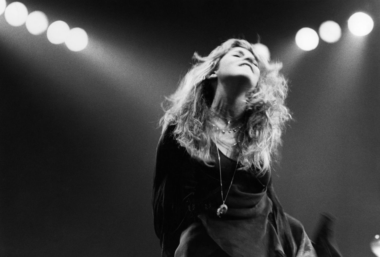 Singer/songwriter Stevie Nicks performs onstage. She joined Fleetwood Mac in 1974 with her then-boyfriend Lindsey Buckingham.
