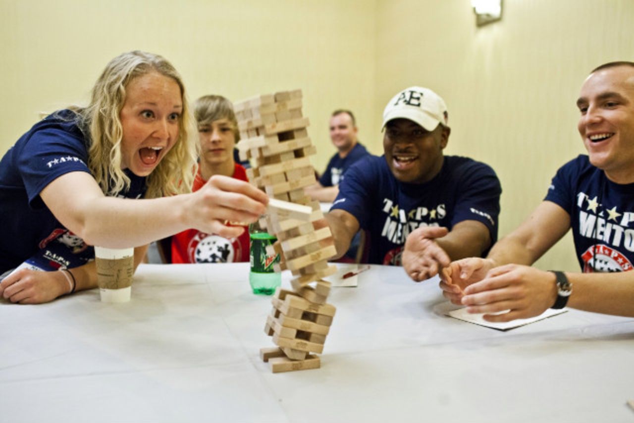 Mentors and peers play games to break the ice and get to know each other.