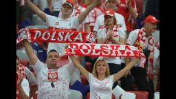 Polish fans cheer before the Euro 2012 football championships match Poland vs. Greece, on June 8, 2012 at the National Stadium in Warsaw.