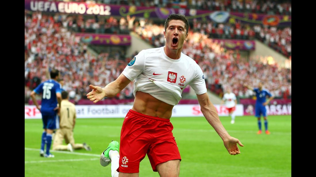 Robert Lewandowski of Poland celebrates scoring the opening goal during the match against Greece.