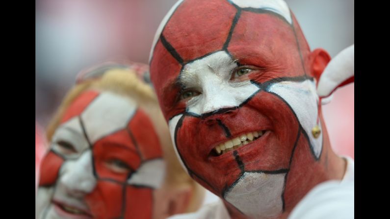 Polish fans cheer before the match between Poland and Greece.