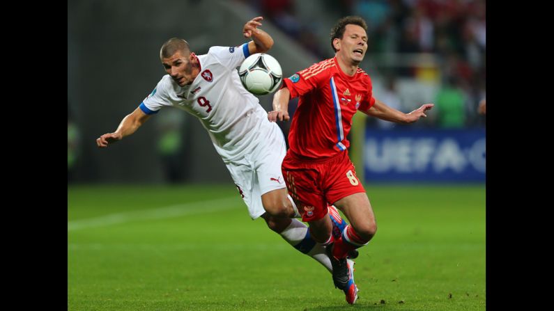 Konstantin Zyryanov of Russia and Jan Rezek of Czech Republic collide.