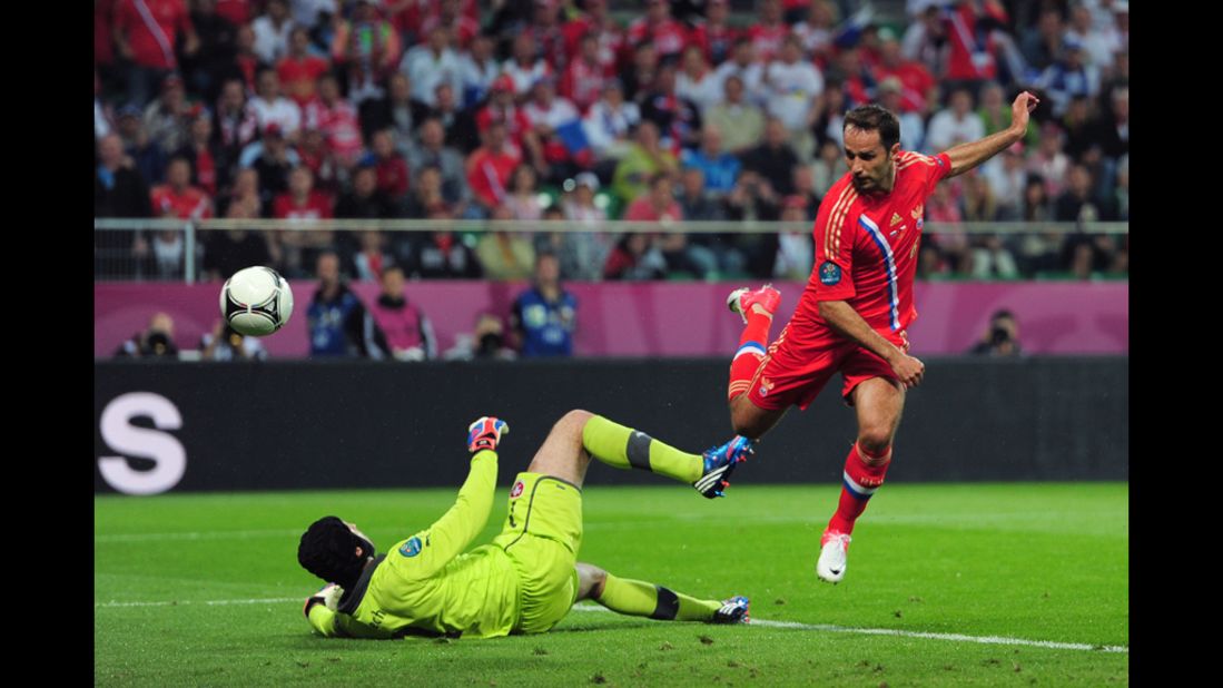 Roman Shirokov of Russia scores the team's second goal past Petr Cech of Czech Republic.