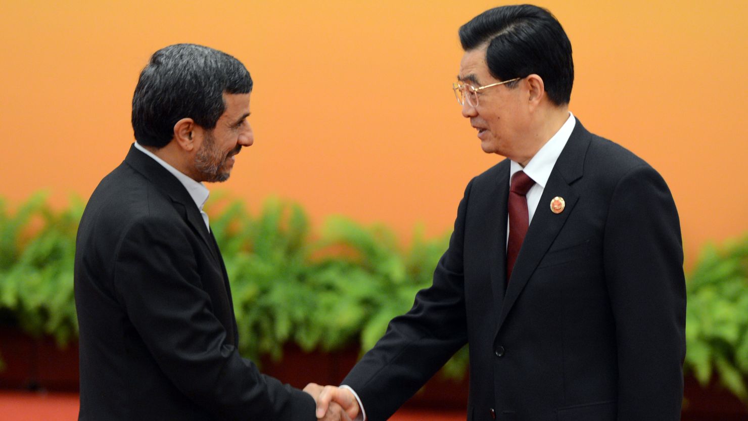 Hu Jintao, right, and Mahmoud Ahmadinejad at the Shanghai Cooperation Organization summit in Beijing on Thursday. 