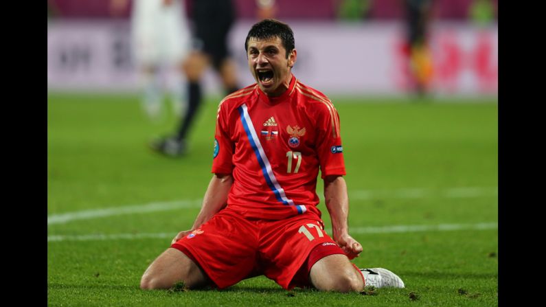 Alan Dzagoev of Russia celebrates scoring the team's third goal against Czech Republic.