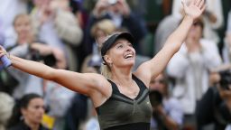 Russia's Maria Sharapova celebrates after winning against Italy's Sara Errani their Women's Singles final tennis match of the French Open