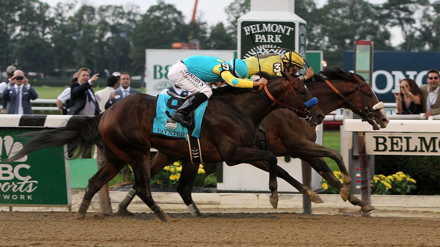 Union Rags, ridden by John Velazquez edges past Paynter, ridden by Mike Smith, to win the Belmont Stakes.
