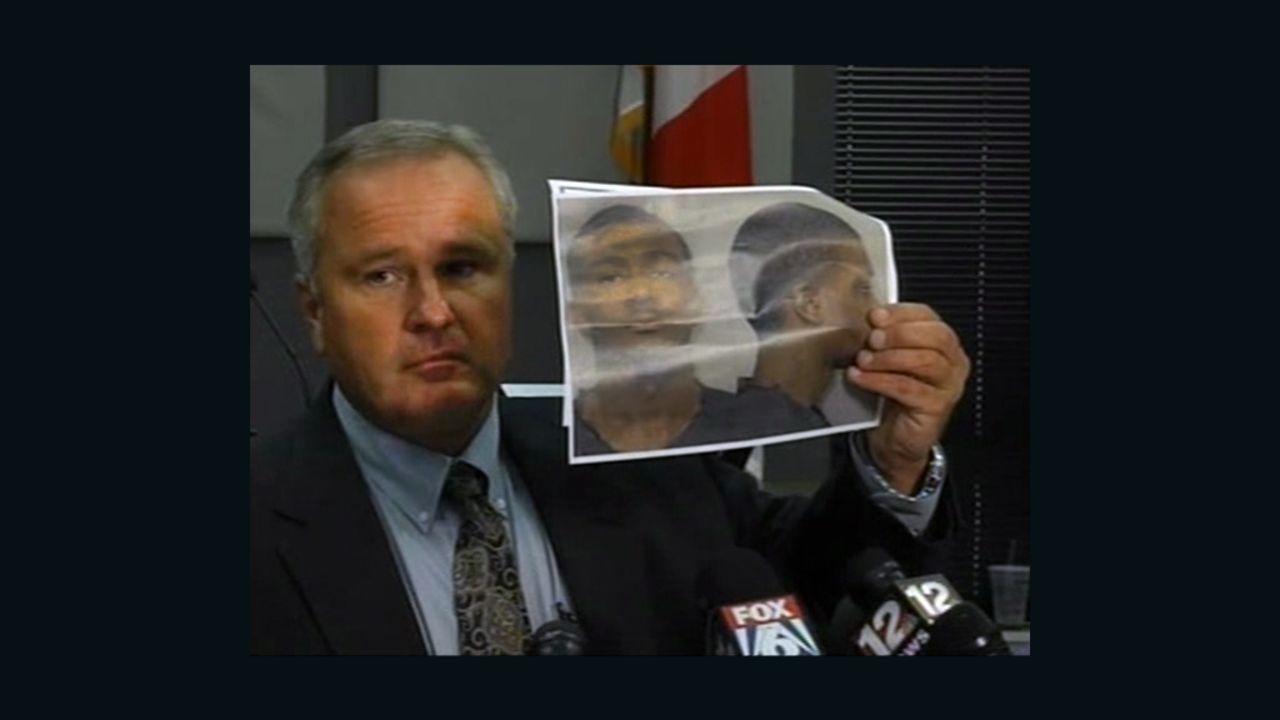 Auburn Police Chief Tommy Dawson at a news conference Sunday holds up a picture of Desmonte Leonard.