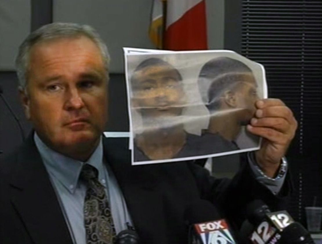Auburn Police Chief Tommy Dawson at a news conference Sunday holds up a picture of Desmonte Leonard.