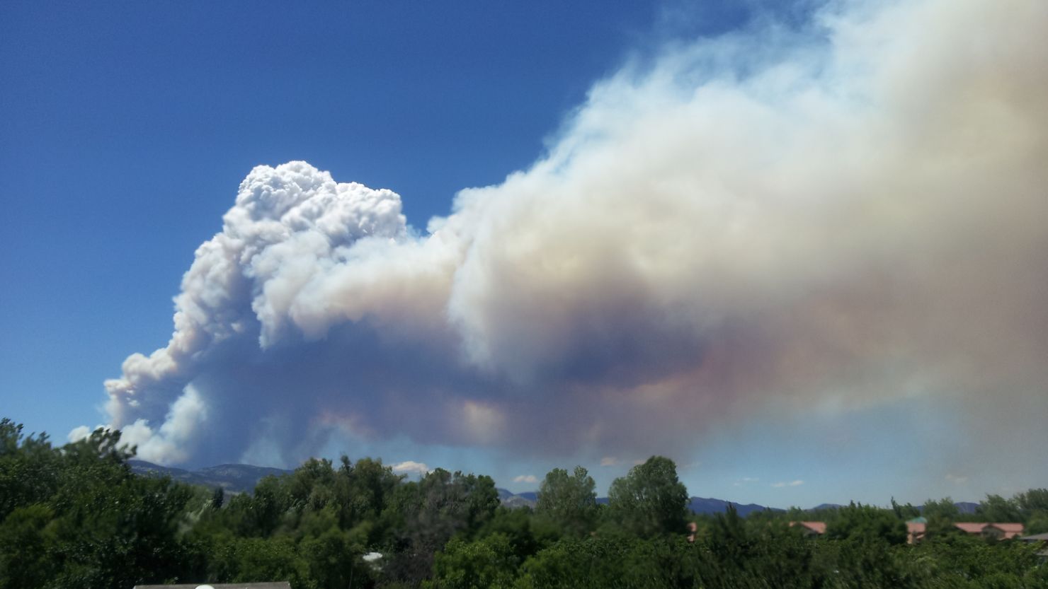Smoke from the wildfire could be seen near the Colorado State University campus on Saturday.