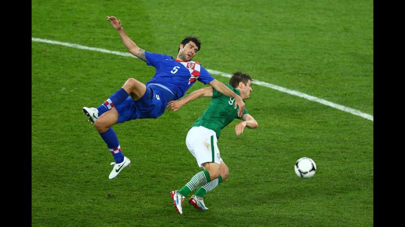 Kevin Doyle of Ireland and Vedran Corluka of Croatia battle for the ball in Poznan, Poland, on Sunday, June 10. 