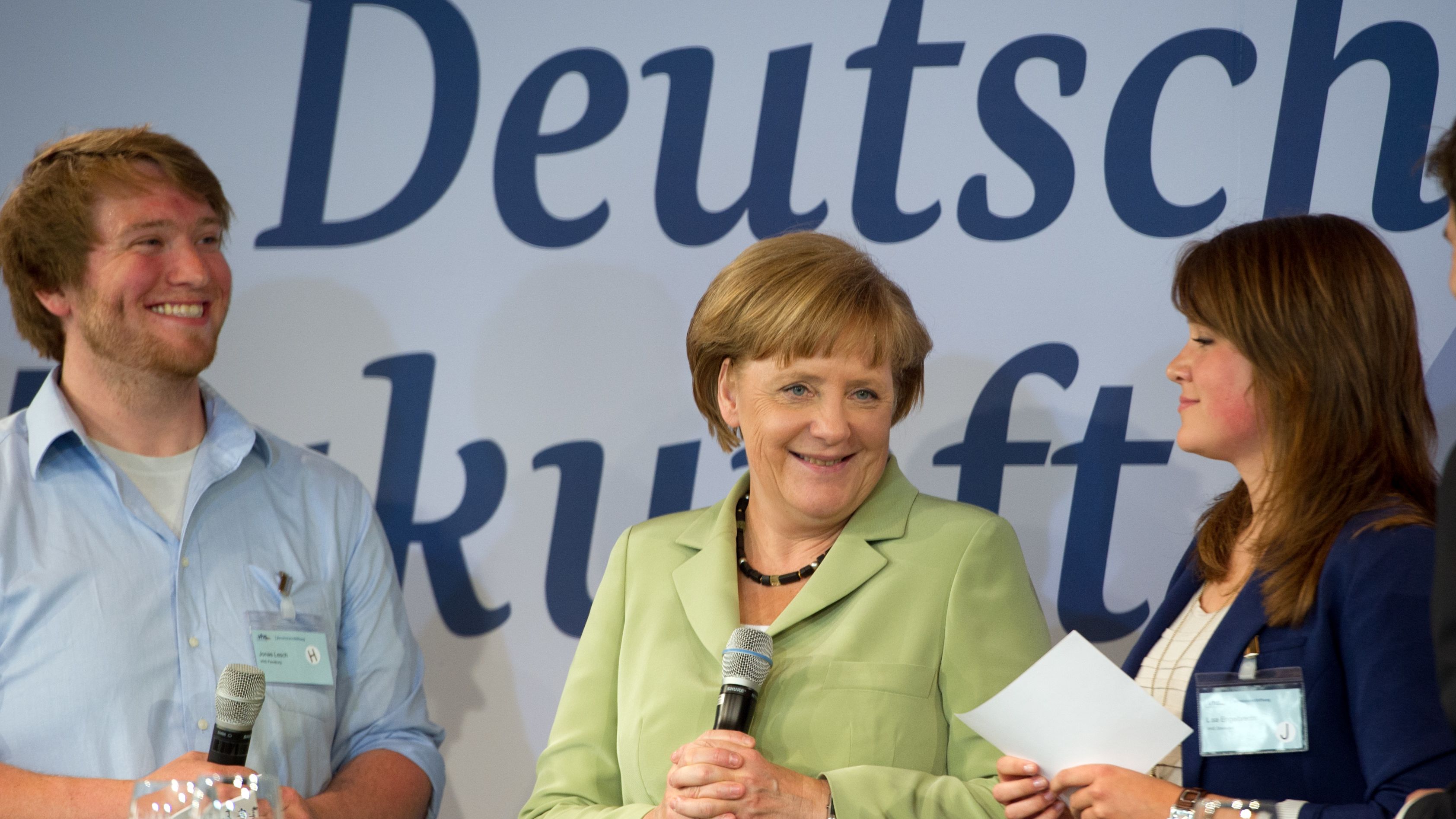 German Chancellor Angela Merkel talks with students during a discussion about Germany's future on June 6 in Berlin.