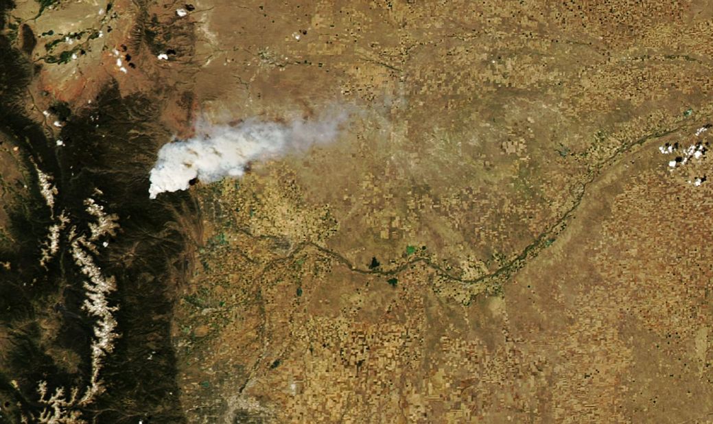 A satellite image from NASA shows a plume of smoke from the High Park Fire about 20 miles northwest of Fort Collins on June 9. 