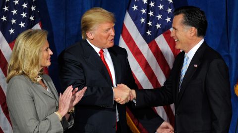 Tycoon Donald Trump endorses Mitt Romney in Las Vegas in February. The candidate's wife, Ann Romney, is also on hand.