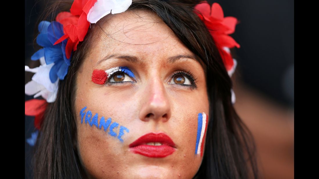 A France fan shows her colors during the game against England.