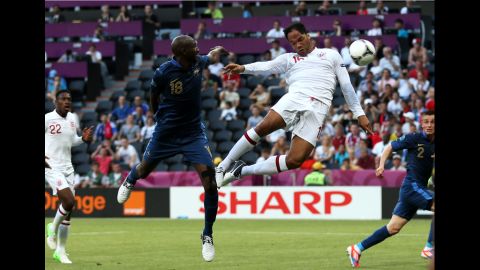 Joleon Lescott of England scores during the first half of the match against France.