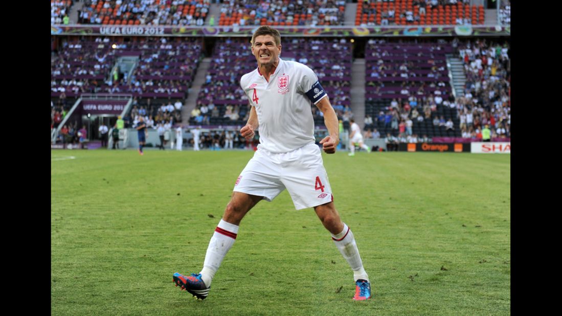 Steven Gerrard of England celebrates after Joleon Lescott's goal against France.