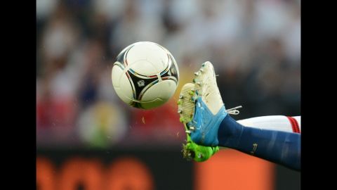 Players compete for control of the ball during the England-France match on Monday.