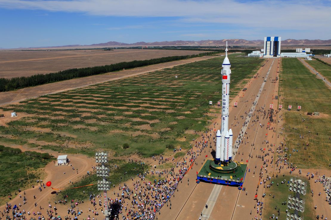 The Shenzhou-9 spacecraft and its carrier rocket as seen Saturday in northwest China's Gansu province.