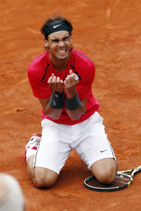 The Spaniard became the first male player to win the clay-court tournament seven times, moving clear of Bjorn Borg after completing a rain-delayed victory over world No. 1 Novak Djokovic.