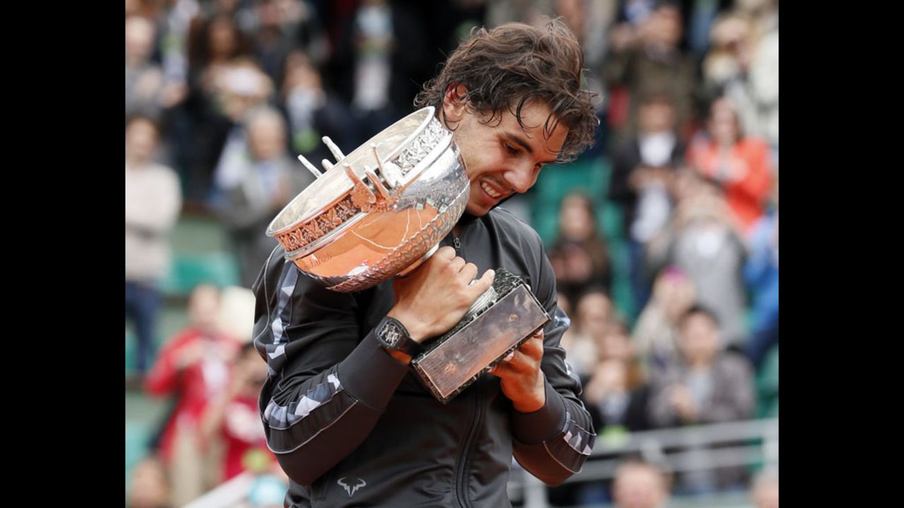 Rafael Nadal of Spain celebrates after beating Novak Djokovic of Serbia to win his seventh French Open title in Paris on Monday, June 11.