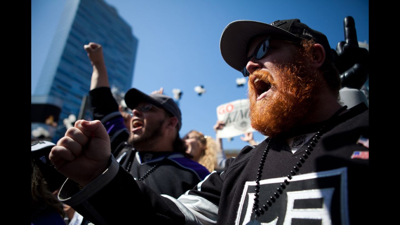 Fans rally in front of the Staples Center before the start of the game.
