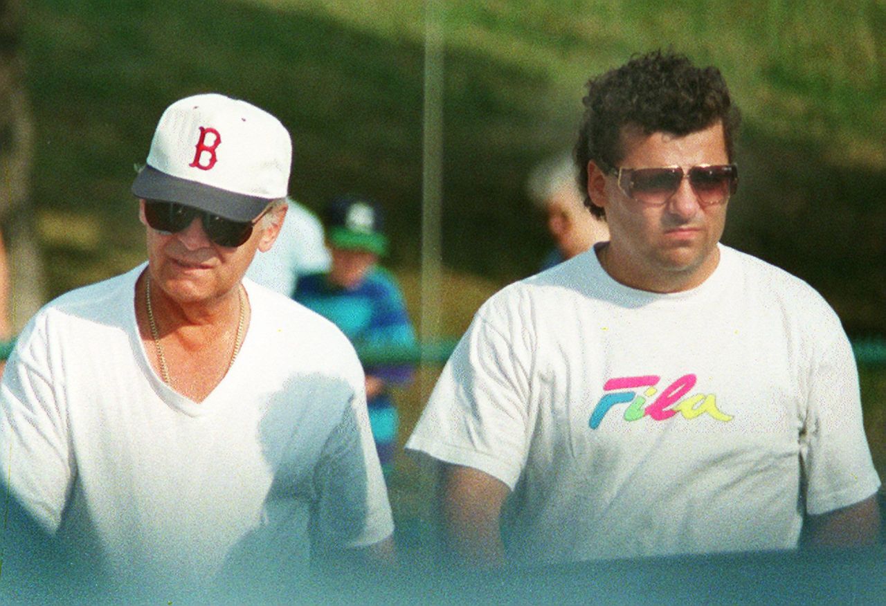 Bulger, left, walks with his onetime friend and confidant Kevin Weeks in Boston in 1994. Weeks later turned on his former boss. In 2000, Weeks led police to the bodies of eight alleged Bulger victims buried around Boston. 