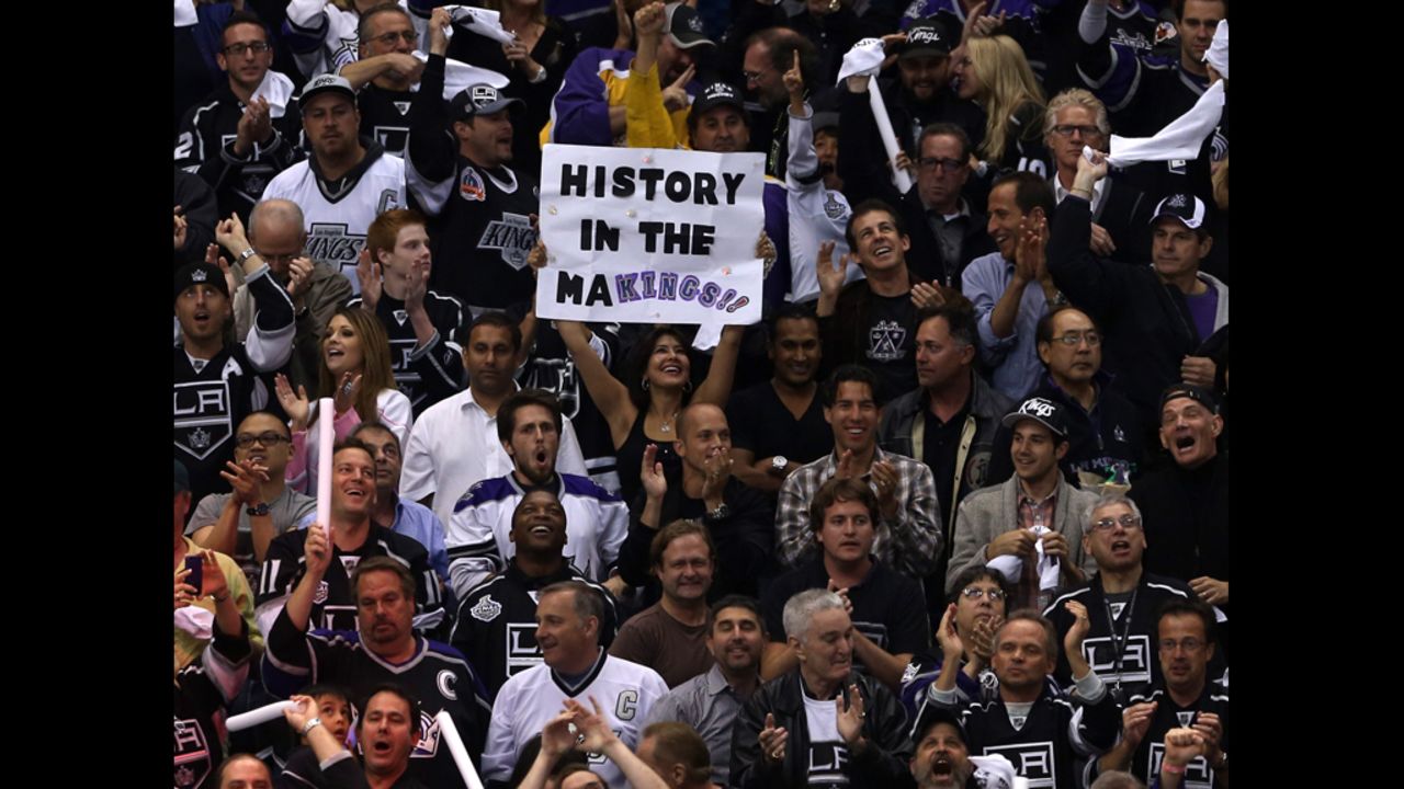 A Kings fan holds up a sign that reads, "History in the Makings." Leading up to game six, the team's 3-0 series lead was cut to 3-2.