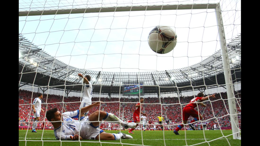 The Czech Republic's Vaclav Pilar, right, scores the second goal of the match against Greece.