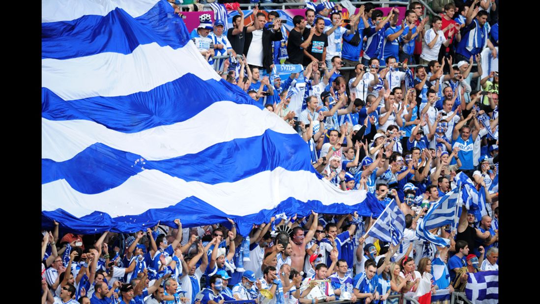 Fans cheer for Greece during its Group A match against the Czech Republic on Tuesday.
