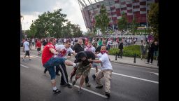 Polish and Russian football fans clash in Warsaw, Poland, on Tuesday ahead of the match between Poland and Russia at the Euro 2012 championships.