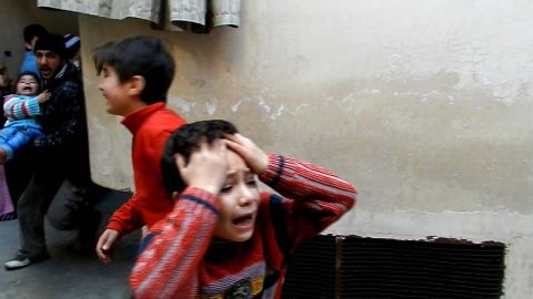 Photography is one of the most important journalistic tools to tell a story.  The following photos illustrate some of the tragedies that have profoundly changed the world. Here, children are shown in distress during fighting in the restive city of Homs in Syria, in February.