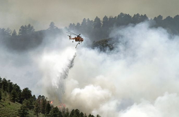 iReporter Victor W. Schendel, a Fort Collins photographer, has been watching the fast-moving wildfire grow and took this photo Tuesday as firefighters attempted to control the blaze. 