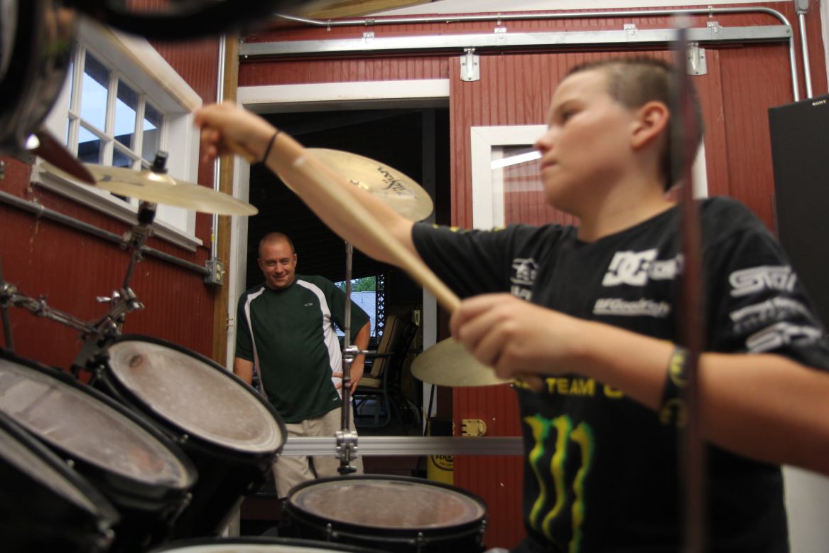 Watson hasn't had to sell the drum set, which both father and son play. The love of drums unites the two, who relentlessly tap their fingers on the kitchen table when they're not playing.
