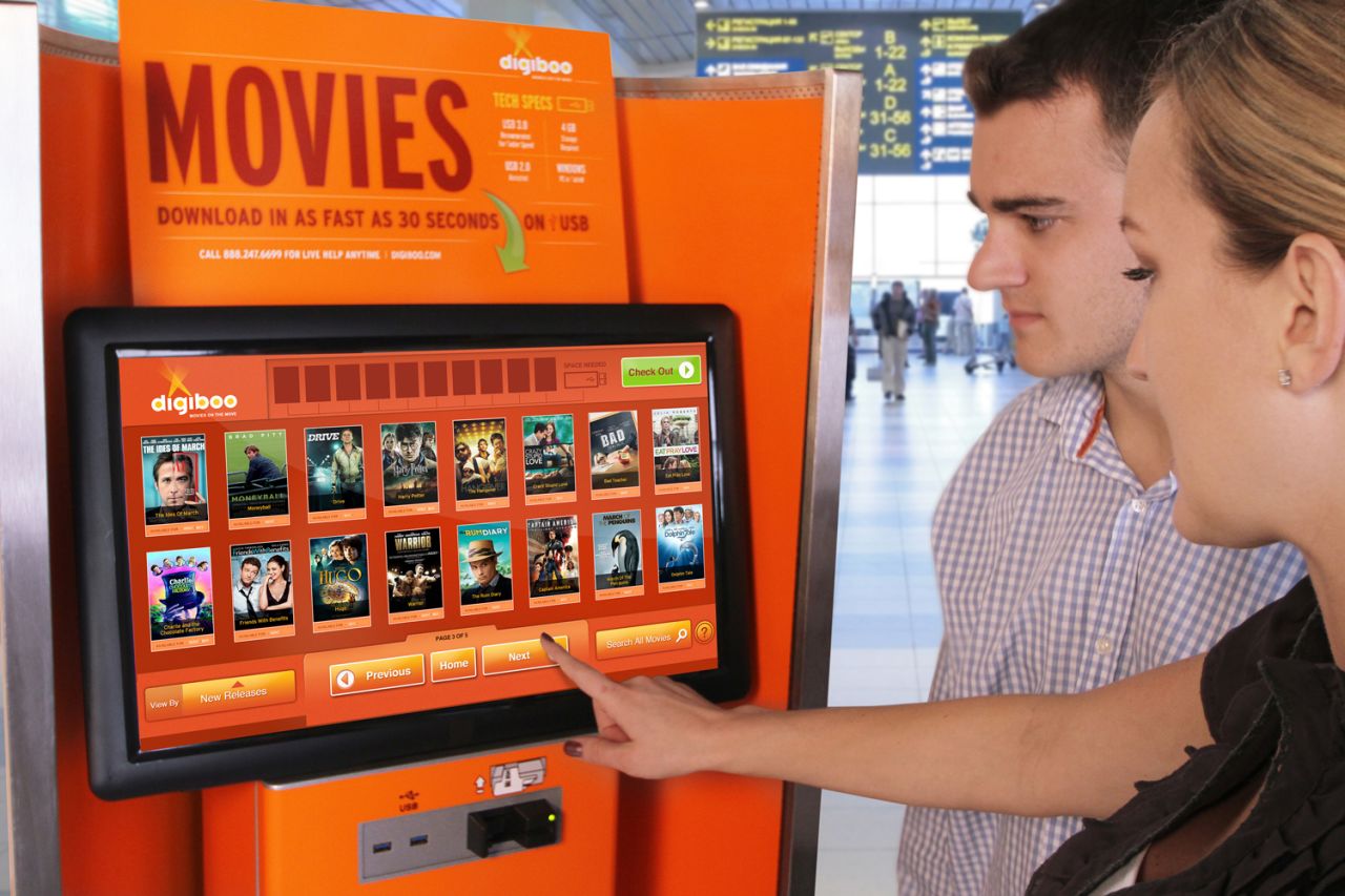 At Digiboo kiosks, travelers can download, via flash drive, digital versions of more than 500 movies that they can then watch on their laptop or tablet while in-flight or just hanging around the terminal.