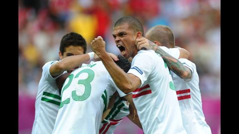 Pepe celebrates after Helder Postiga of Portugal scored the second goal against Denmark.