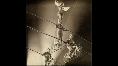 The Wallendas perform the four-person pyramid, one of their signature acts. In 1948, the team created a seven-person pyramid.
