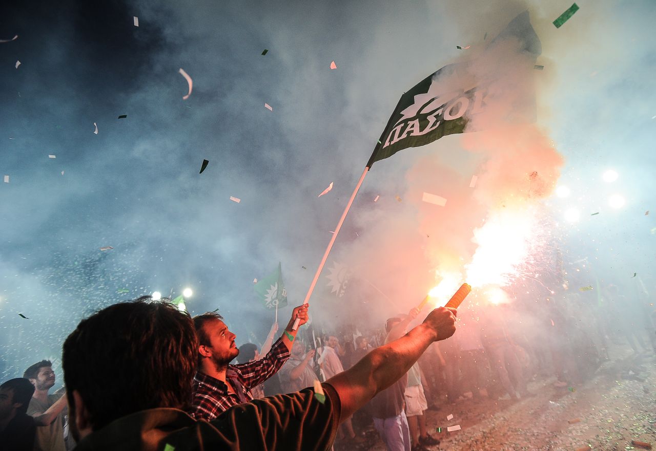 Supporters of the Greek socialist party Pasok set off fireworks during a pre-election campaign rally in Athens on June 13, 2012. The country is set to go to the polls for a second time on June 17 after failing to form a government following the May 6 election.