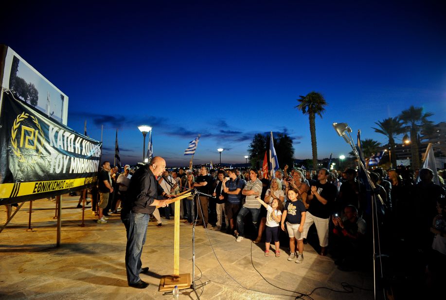 Ilias Panagiotaros, member of extreme right ultra nationalist party Golden Dawn (Chrysi Avgi), speaks during a pre-election rally in Athens on June 11, 2012. He caused controversy after saying: "If Chrysi Avgi gets into parliament it will carry out raids on hospitals and kindergartens and it will throw immigrants and their children out on the street so that Greeks can take their place."