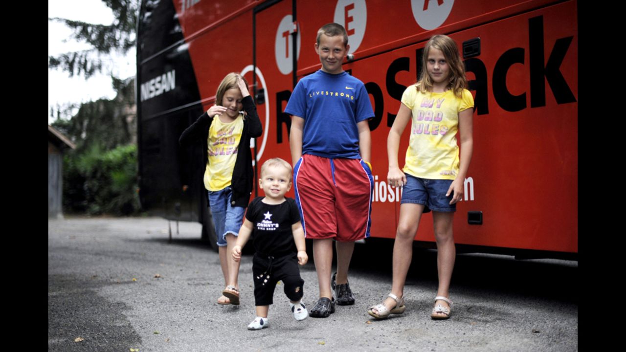 Armstrong's son Luke; his twin daughters, Isabelle and Grace; and his 1-year-old son, Max, stand outside the Radio Shack team bus on a rest day during the 2010 Tour de France.