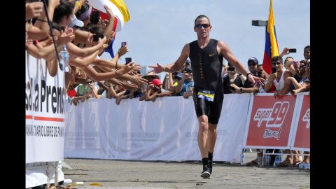 Armstrong competes in the 70.3 Ironman Triathlon in Panama City, Florida, in February 2012. He went on to claim two Half Ironman triathlon titles by June of that year.