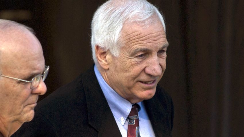 BELLEFONTE, PA - JUNE 13: Former Penn State assistant football coach Jerry Sandusky (R) arrives at the Centre County court house before the third day of his child sex abuse trial on June 13, 2012, in Bellefonte, Pennsylvania. Sandusky is charged with 52 criminal counts of alleged sexual abuse of children. (Photo by Jeff Swensen/Getty Images) 