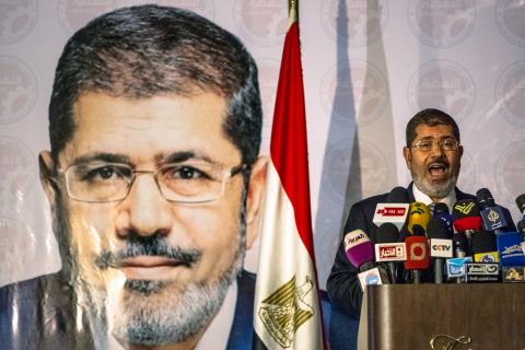 The Muslim Brotherhood on Sunday claims its candidate, Mohamed Morsi, has defeated foe Ahmed Shafik to become Egypt's president. 