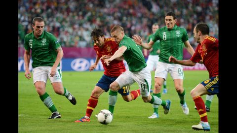 David Silva of Spain battles for the ball with Damien Duff of Ireland.