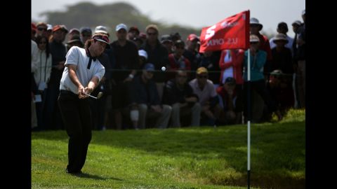 Bubba Watson plays a shot on the second hole during the first round.