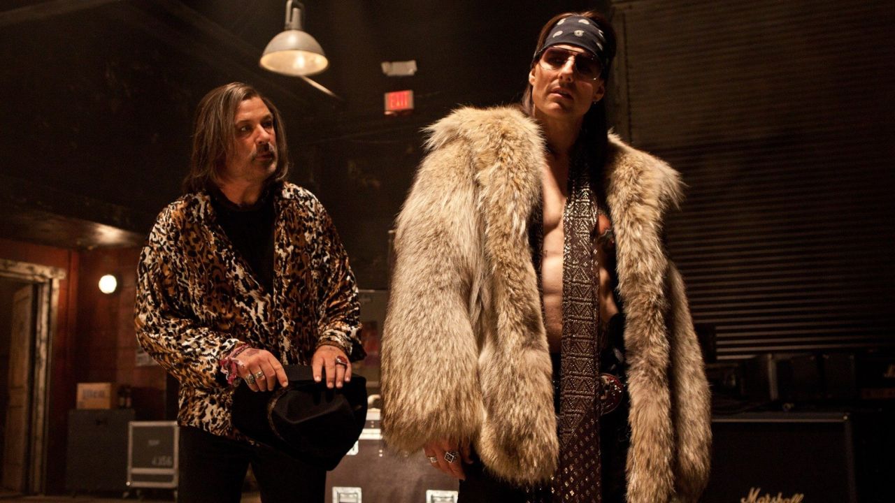 Alec Baldwin, left, stars as Dennis Dupree and Tom Cruise stars as Stacee Jaxx in Adam Shankman's "Rock of Ages."