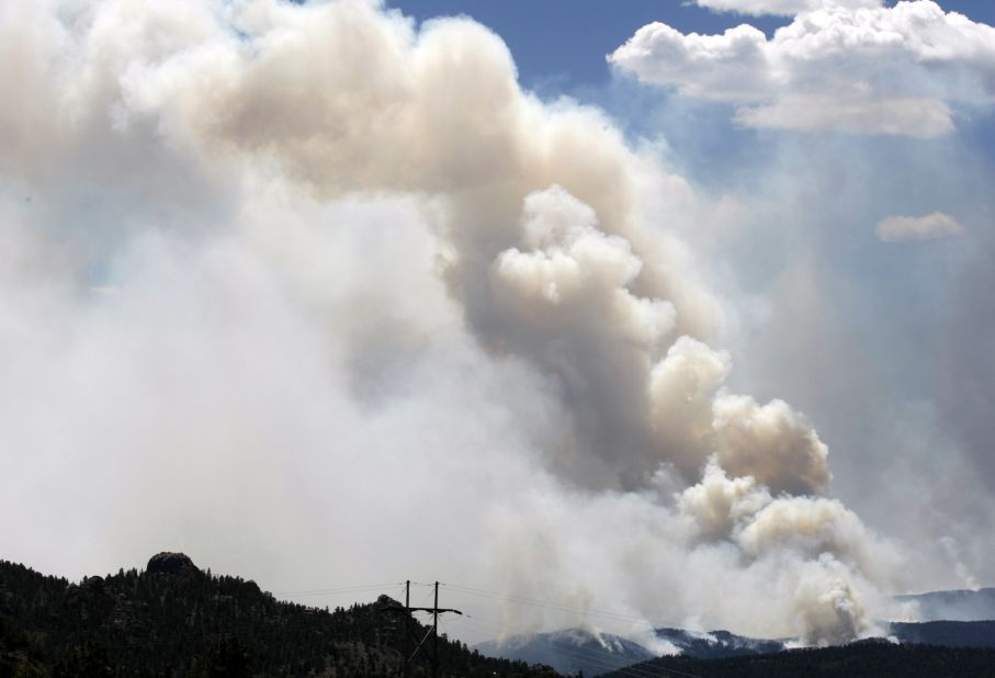 A large smoke plume rises from the High Park Fire west of Fort Collins on Wednesday. 