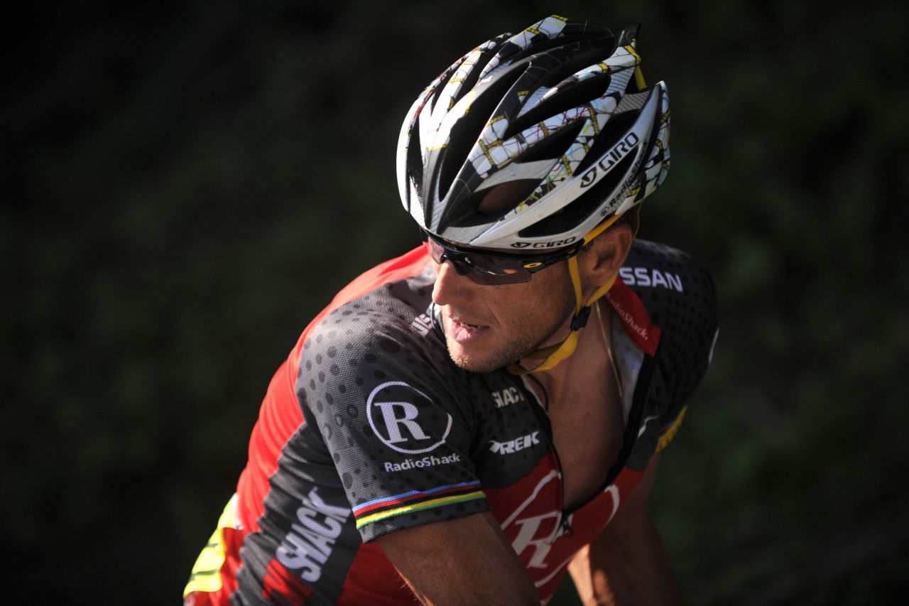 Armstrong looks back as he rides during the 2010 Tour de France.