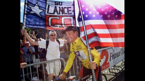 Armstrong takes his honor lap on the Champs-Élysées in Paris after winning the Tour de France for the first time in 1999.